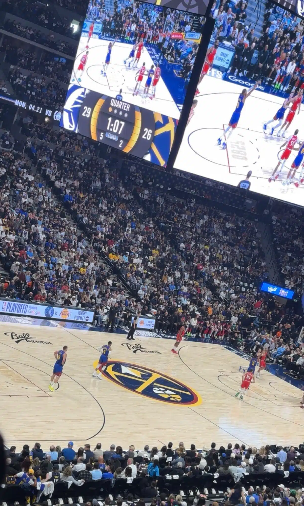 A packed Ball Arena crowd watches the Nuggets during a 2025 playoff game